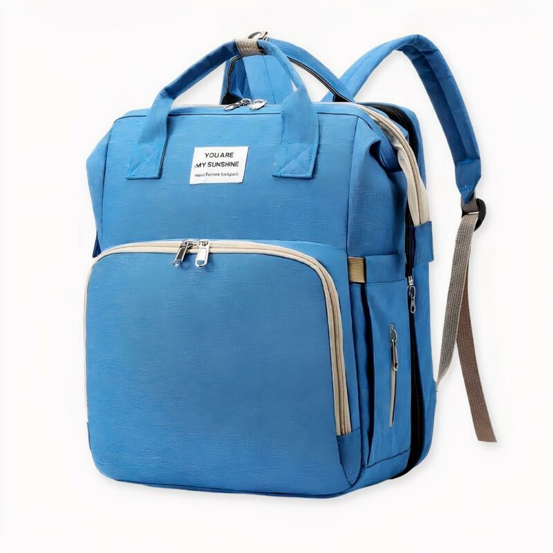 IMG_Rucksack_lange_bébé_1F Dieser revolutionäre Baby-Wickelrucksack verwandelt sich in eine Windel, mit der Sie die Windeln Ihres Babys wechseln können. Sie können es nun jederzeit hinlegen und überall wickeln. Der Rucksack hat viele Taschen und drei Flaschentaschen auf der Vorderseite mit Isolierung, um die Temperatur zu halten. Die Tasche ist wasserabweisend und das gesamte herausnehmbare Futter ist waschbar.