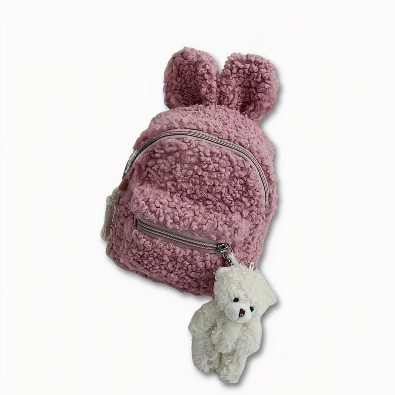 Weicher Kinderrucksack mit grünem Kaninchen, weißem Bett, Buch und Teddybär