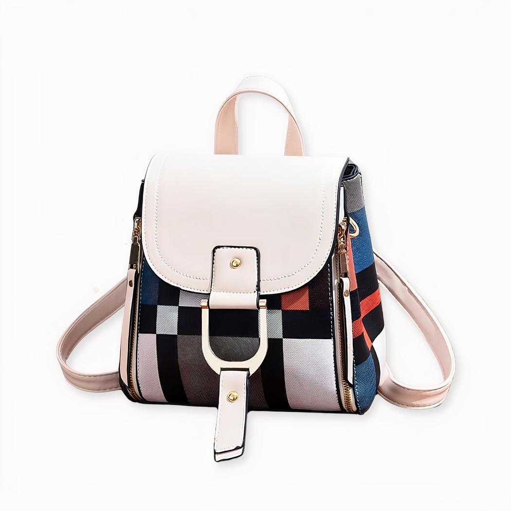 Ein kleiner, mehrfarbiger Vintage-Rucksack, der sowohl Vintage als auch modern ist. Die Motive dieser Tasche sind ein Spiel aus farbigen Quadraten, die an das Mondrian-Design erinnern. Eine definitiv modische und praktische Tasche.