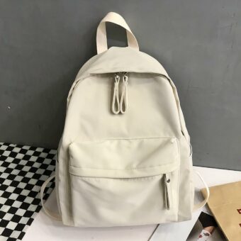 Anti-Diebstahl-Rucksack aus Canvas mit grauem Hintergrund