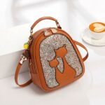 Glitter-Rucksack aus Leder mit Katzenmotiv - Braun - Handtasche Riemen