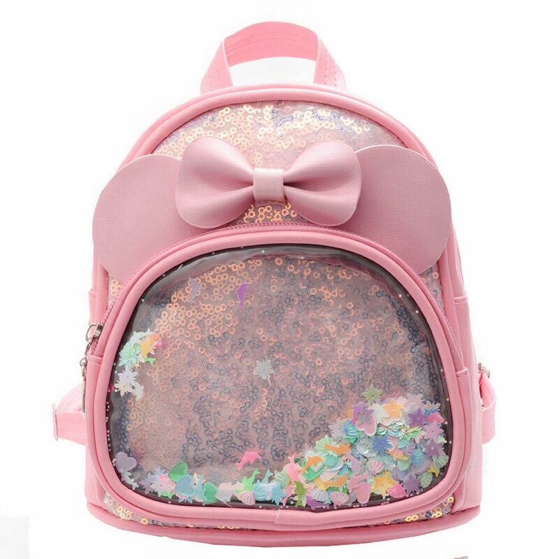 Kleiner Mädchen-Rucksack mit rosa Schleife und weißem Hintergrund