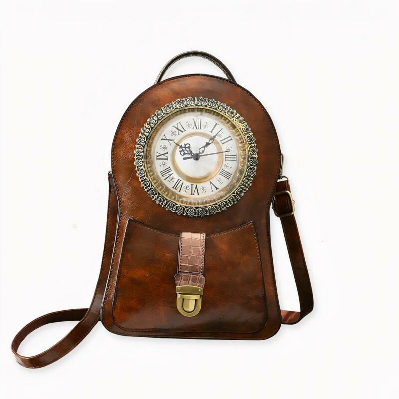 IMG_Rucksack_vintage_horloge_1F Machen Sie eine Zeitreise mit diesem Vintage-Rucksack aus Lederimitat, der eine Uhr darstellt! Erhältlich in rot, schwarz und braun, wählen Sie die Farbe, die am besten zu Ihnen passt. Seine originelle Form, die goldenen Details und die lebensechte Uhr machen ihn zu einem einzigartigen Rucksack voller Charme!