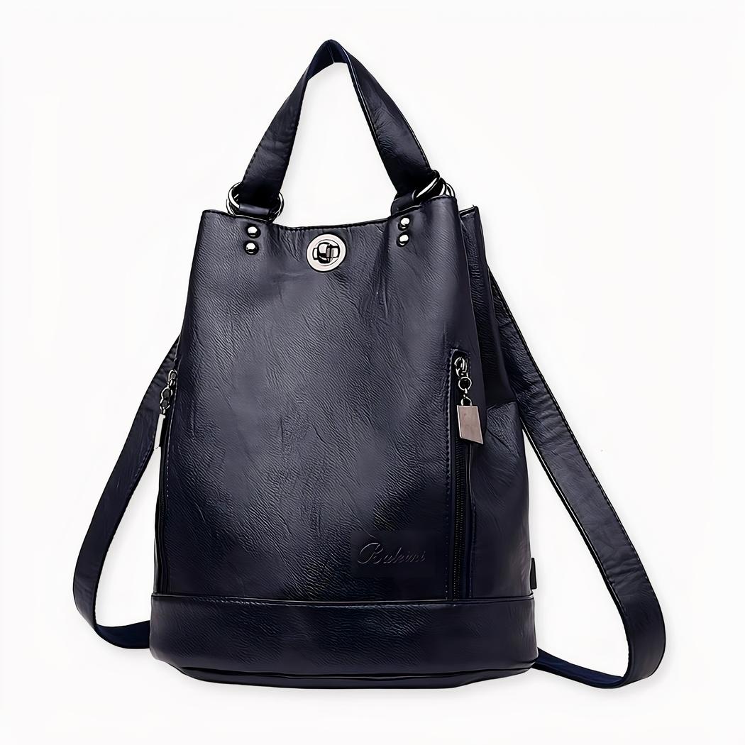 Diese Vintage-Tasche aus Kunstleder in Form eines Geldbeutels verleiht jedem Outfit einen Hauch von Originalität und Praktikabilität! Mit ihren zahlreichen Fächern bietet sie Platz für all Ihre Sachen, wenn Sie in der Stadt oder am Strand spazieren gehen. Erhältlich in schwarz, blau, grau, lila und rot, Sie haben die Qual der Wahl!