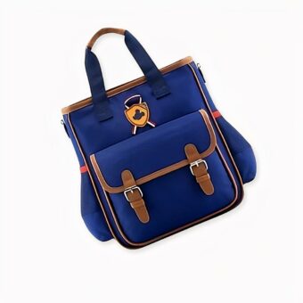 Blaue Umhängetasche aus Canvas mit Mickey-Mouse-Logo für Kinder mit einer Tasche auf der Vorderseite. Gute Qualität und sehr modisch.