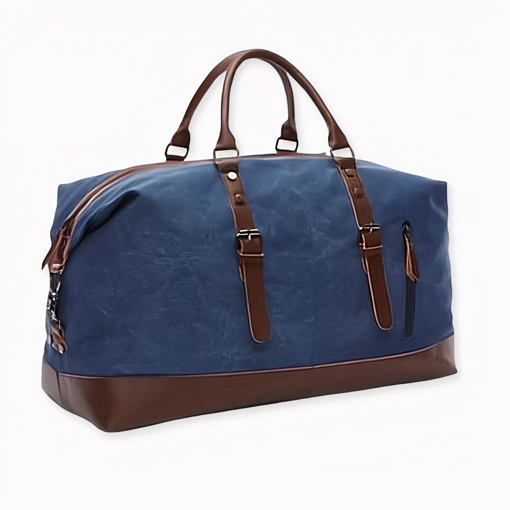 Herren-Reisetasche aus blauem und braunem Canvas mit weißem Hintergrund